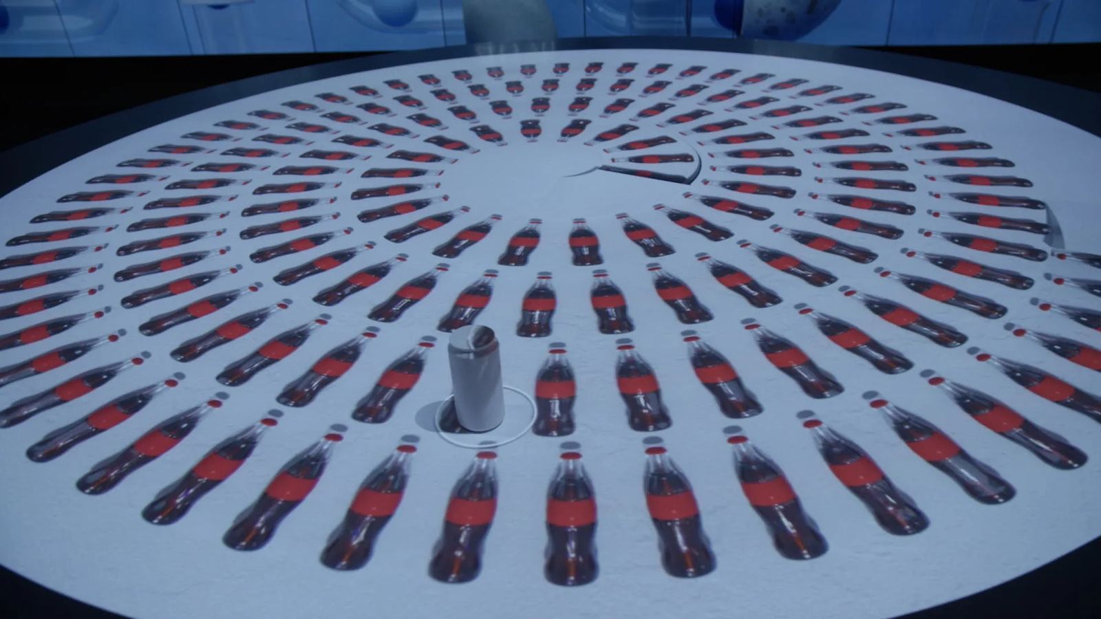 An interactive table projects rings of bottles around a physical can
