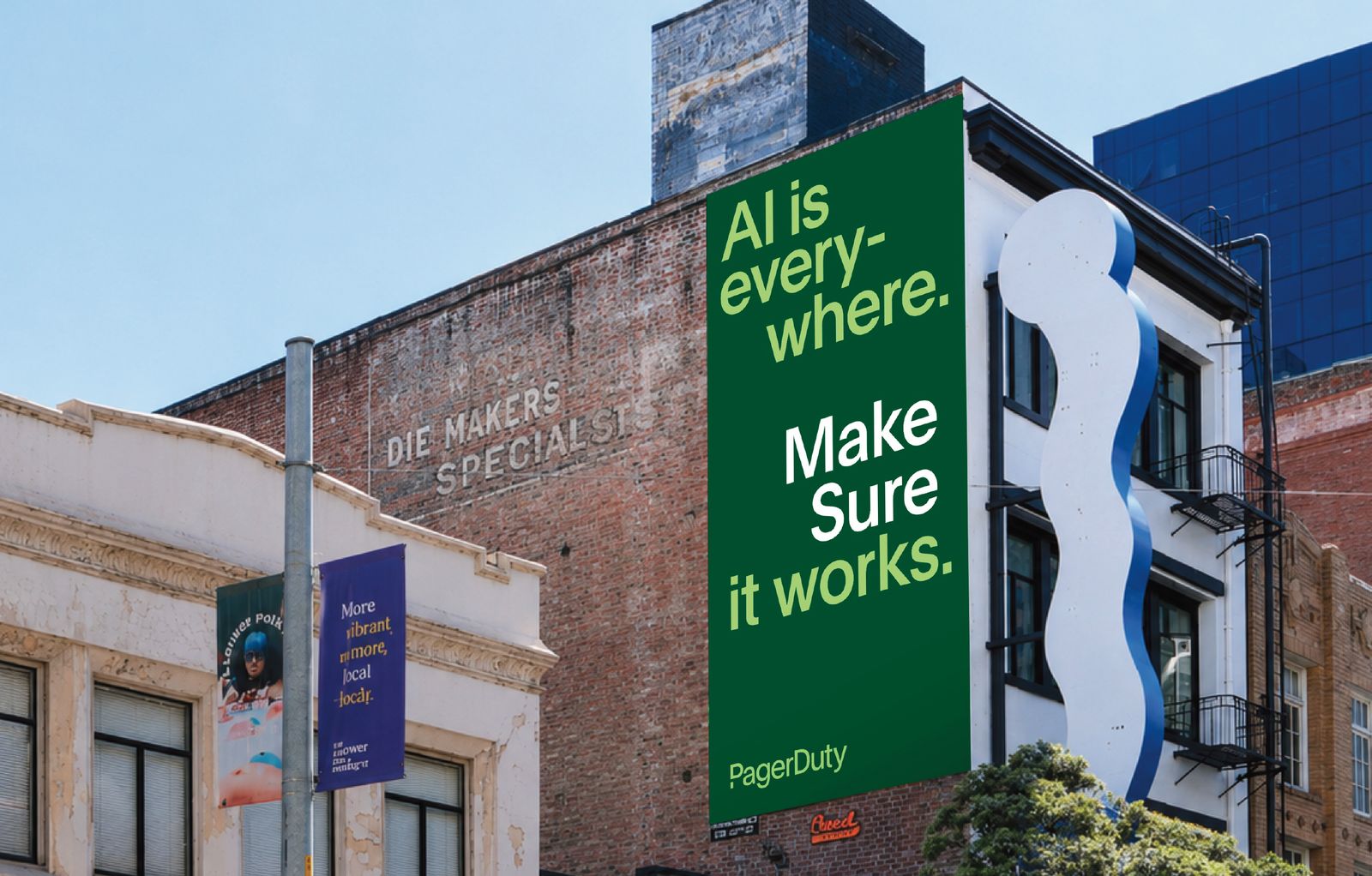 A PagerDuty building wrap reading AI is everywhere. Make Sure it works.